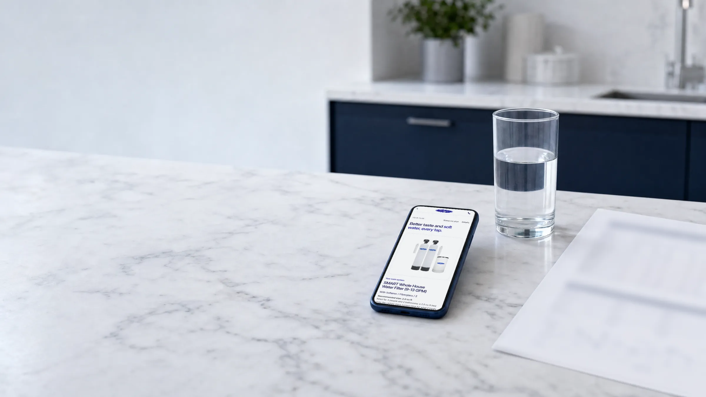 A Water Wizard plan displayed on a phone on a kitchen counter